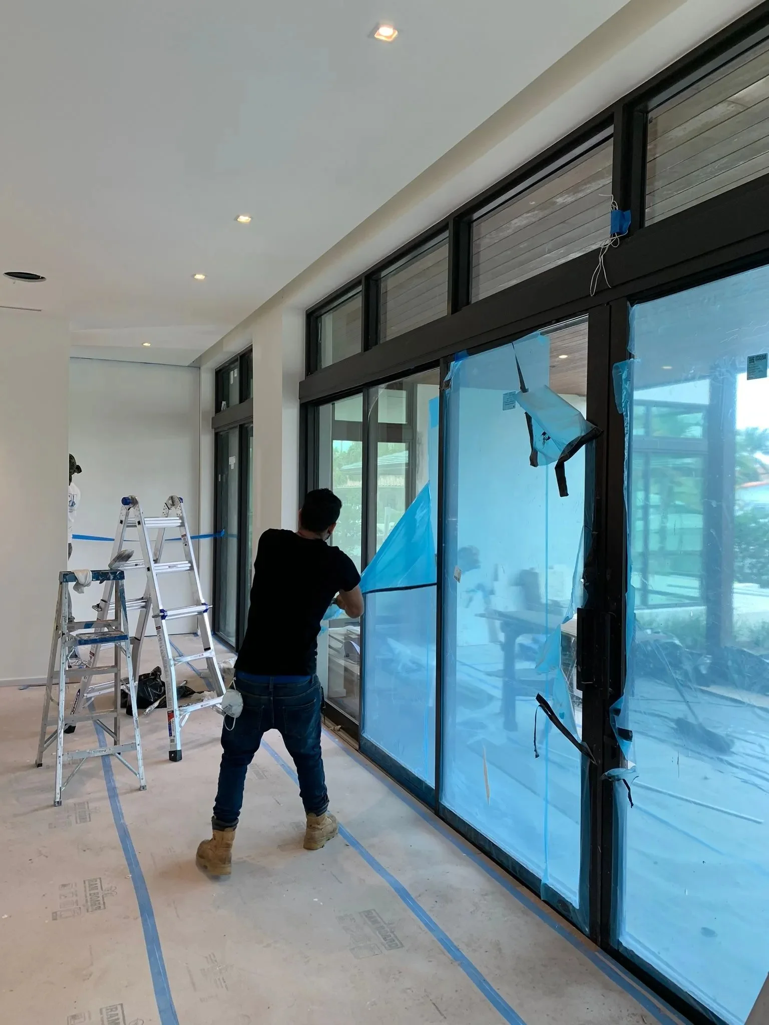 Residential post-construction cleanup in Homestead FL removing dust and debris